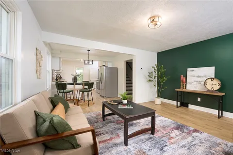 Living room open concept green accent